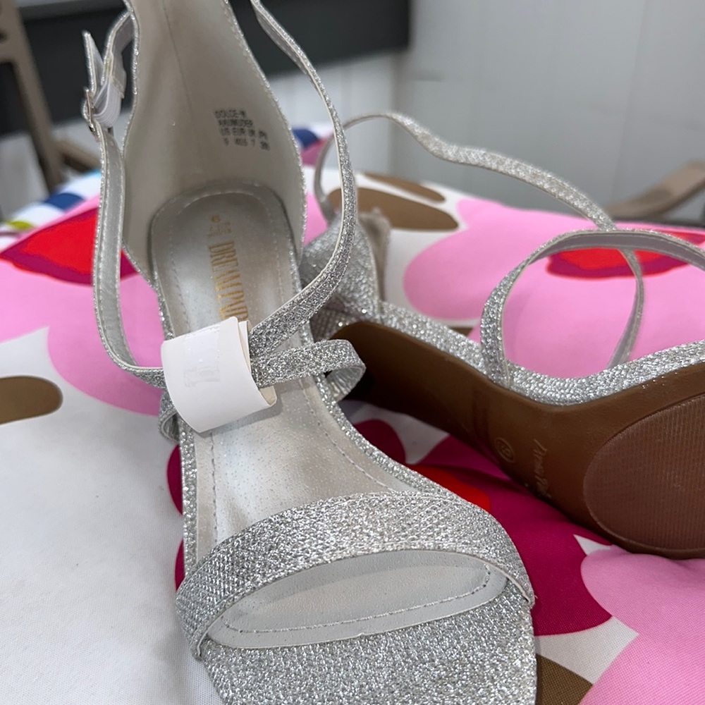 Silver Dream Paris 4 inch size 9 heels . Ankle strap. Brand new